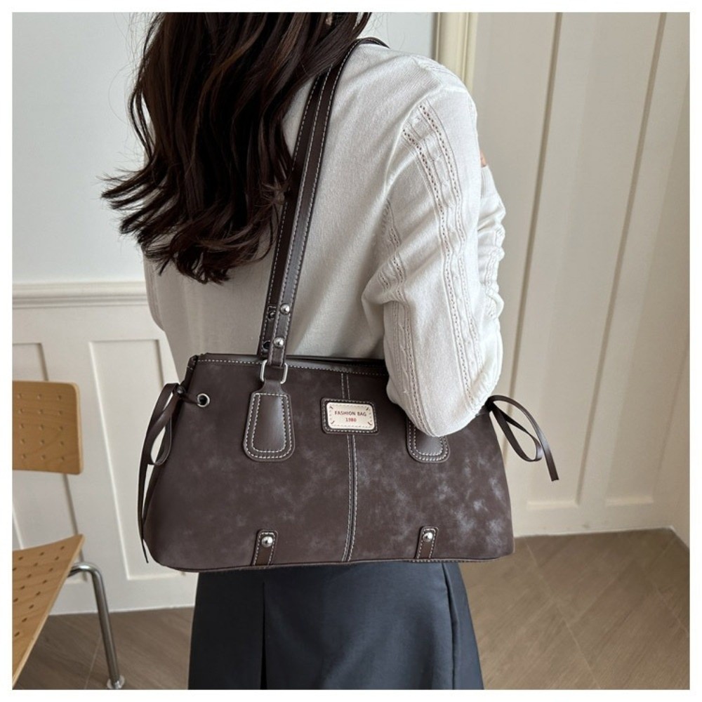 Minimalistyczna torba typu tot – Structured Handbag Top Handle recenzja i cena