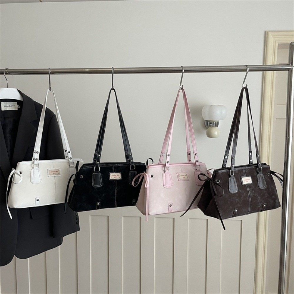 Minimalistyczna torba typu tot – Structured Handbag Top Handle recenzja i cena