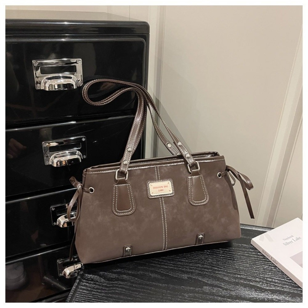 Minimalistyczna torba typu tot – Structured Handbag Top Handle recenzja i cena